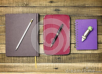 Set old notebook and pencil on wood background Stock Photo