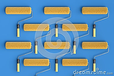 Set of paint rollers for painting walls and renovating apartment on blue. Stock Photo