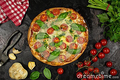 Keto Tortilla Pizza with Shredded Mozzarella, Sliced Cherry Tomatoes and Basil Stock Photo