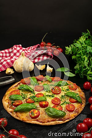 Keto Tortilla Pizza with Shredded Mozzarella, Sliced Cherry Tomatoes and Basil Stock Photo