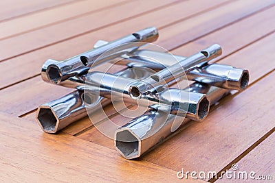 Set of pipe wrenches as construction on table Stock Photo