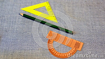 Set of plastic rulers and a protractor between the pencil Stock Photo