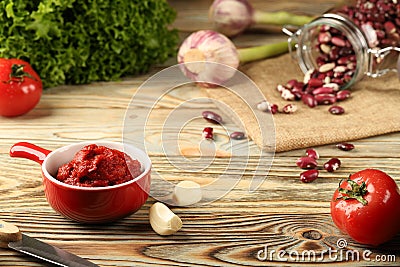 A set of products for dish, beans in tomato sauce. Stock Photo