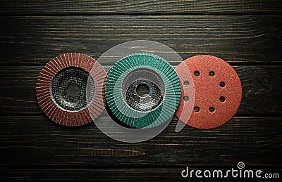 A set of round carpentry tools for polishing and cleaning boards or whetstones. Abrasive tools on black boards Stock Photo