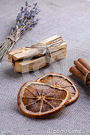 A set for scenting the room during meditation, air flavors in the home: wooden sticks palo santo, lavender, citrus Stock Photo