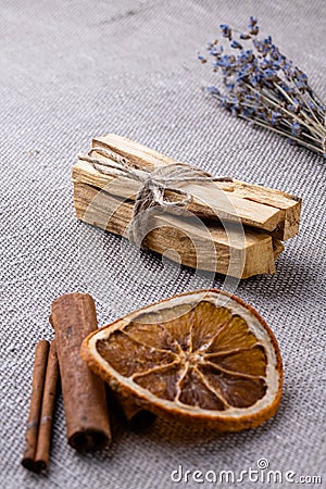 A set for scenting the room during meditation, air flavors in the home: wooden sticks palo santo, lavender, citrus Stock Photo