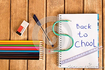 Set of school supplies on wooden background . Back to school Stock Photo