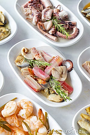 Set of Seafood Dishes. Selective focus fish salad. Stock Photo