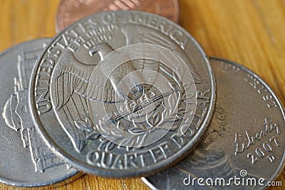 Set of silver Quarter Dollar coins currency in the USA, American Dollar on the wooden background Stock Photo
