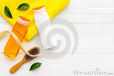 Set of spa and hair care herbal products with strand of blonde hair, top view Stock Photo