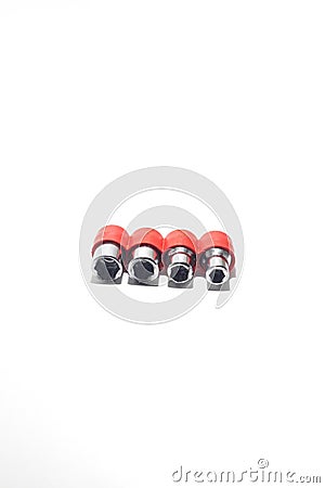 Set of stainless steel hex sockets on shiny white surface Stock Photo