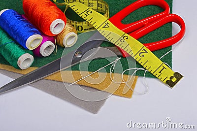 Set of tailoring tools, threads and fabric Stock Photo