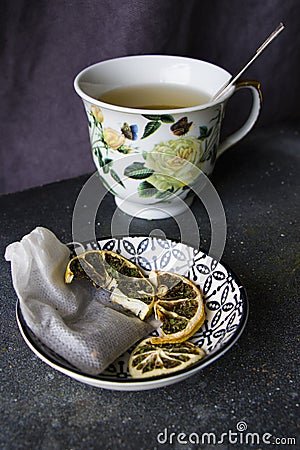 Set of tea, vintage silver spoons, various of tea and cup of tea Stock Photo