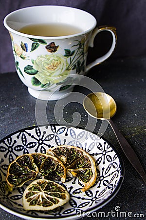 Set of tea, vintage silver spoons, various of tea and cup of tea Stock Photo