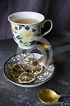 Set of tea, vintage silver spoons, various of tea and cup of tea Stock Photo