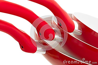 Set of three frying pans, red Stock Photo