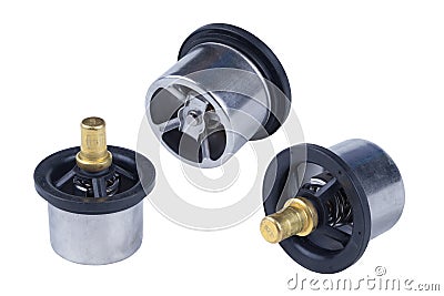 Set of three thermostats of the truck engine cooling system. Spare parts on white background Stock Photo