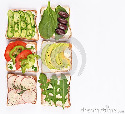 Set with toast bread and different vegan toppings on white background, top view. Toasts with avocado, spinach, arugula and other Stock Photo