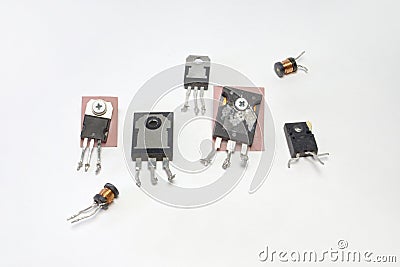 Set of transistors and high-frequency inductance coil. Stock Photo