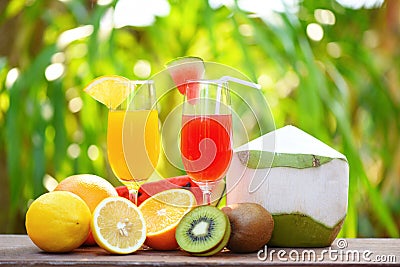 Set of tropical fruits colorful and fresh summer juice glass healthy foods Stock Photo