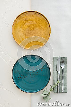 Set of two empty plates with cutlery on table. View from above Stock Photo