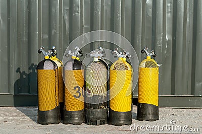 Set of yellow oxygen bottles for scuba diving Stock Photo