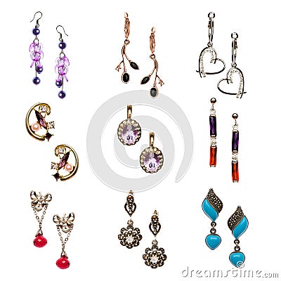 Set of various earrings isolated on white Stock Photo