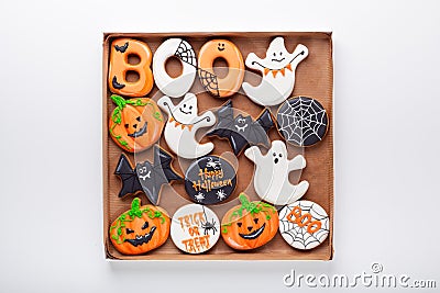 Set of various Halloween gingerbread cookies on white background. Bright homemade cookies for Halloween party Stock Photo