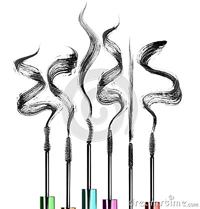 Set of various mascara brushes with mascara strokes close-up Stock Photo