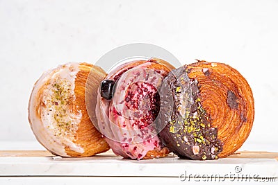 Set of various Round Croissants, Trendy baked Sweet Pastry Stock Photo