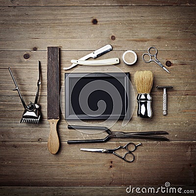 Set of vintage tools of barber shop with black picture frame Stock Photo