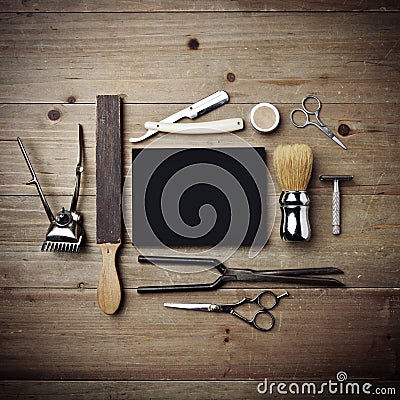 Set of vintage tools of barber shop with black poster Stock Photo