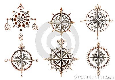 Set of vintage wind roses, compasses. Icons and design elements. Vector Illustration