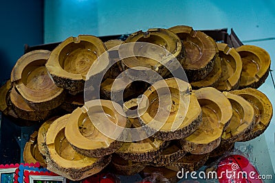 Set of wooden ashtrays for sale in view Stock Photo