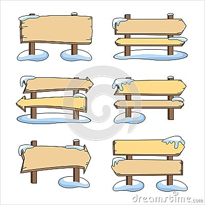 Set of wooden pointers in the snow Stock Photo