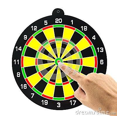 Setting goal or accurate planning, finger going to take dart Stock Photo