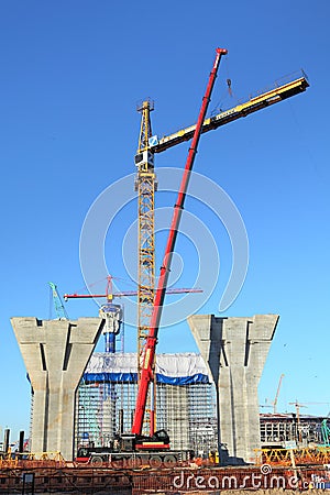 Setting tower crane in construction site Editorial Stock Photo