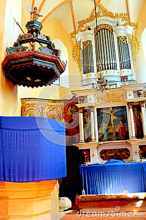 Inside the church of the fortified medieval saxon evangelic church in the village Cloasterf Klosderf, Klosdorf, Nickelsdorf, Tra Editorial Stock Photo