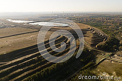 Settling tanks and clarifiers are on wastewater treatment plant. Industrial coal mine, abstract sendimentation tank of mine in Stock Photo