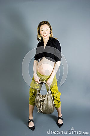 Seven months pregnant Stock Photo