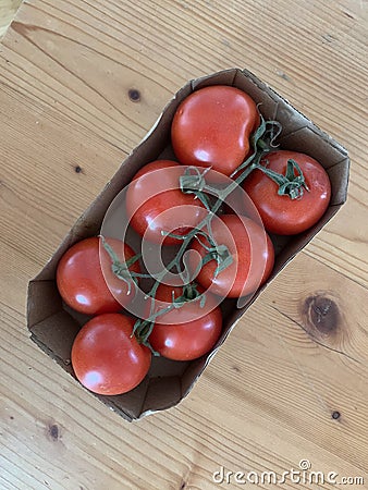 Seven Tomatoes Stock Photo