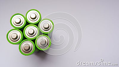 Several AA batteries close-up photo. Used Batteries , Waste, Collection And Recycling. Closeup of pile of alkaline batteries. Stock Photo