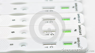 Several antigen tests arranged in a row Stock Photo
