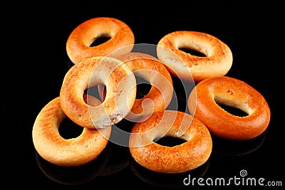 Several bagels on black background Stock Photo
