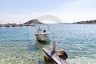 Several boats bobbing in the harbour of Agios Nikolaos, Zakynthos, Greece Editorial Stock Photo