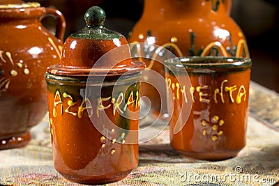 Several ceramics jars for containing saffron and pepper (words written in spanish) Stock Photo