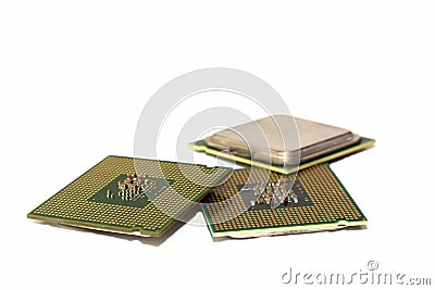 Several CPUs lie on an isolated white background on each other Stock Photo