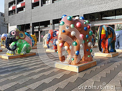 An outdoor exposition of elephants designed in different manners. Tilburg, Netherlands Editorial Stock Photo