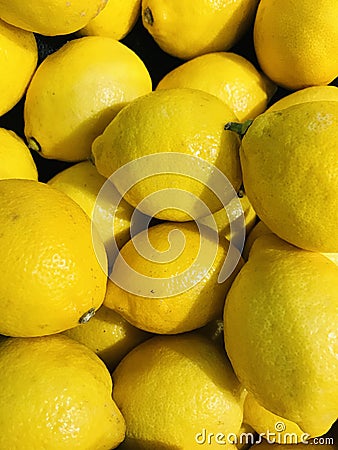 Whole yellow lemons - background Stock Photo
