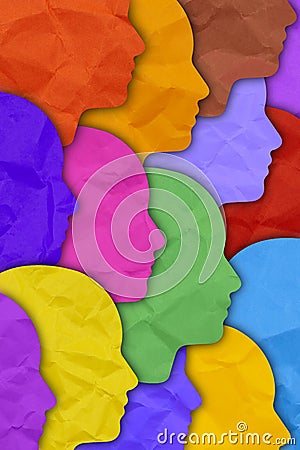 Several human silhouette faces in different colors. Cultural diversity Stock Photo